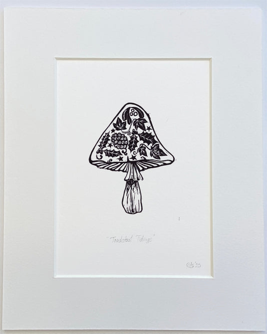 Framed black and white illustration of a decorative mushroom on a white background