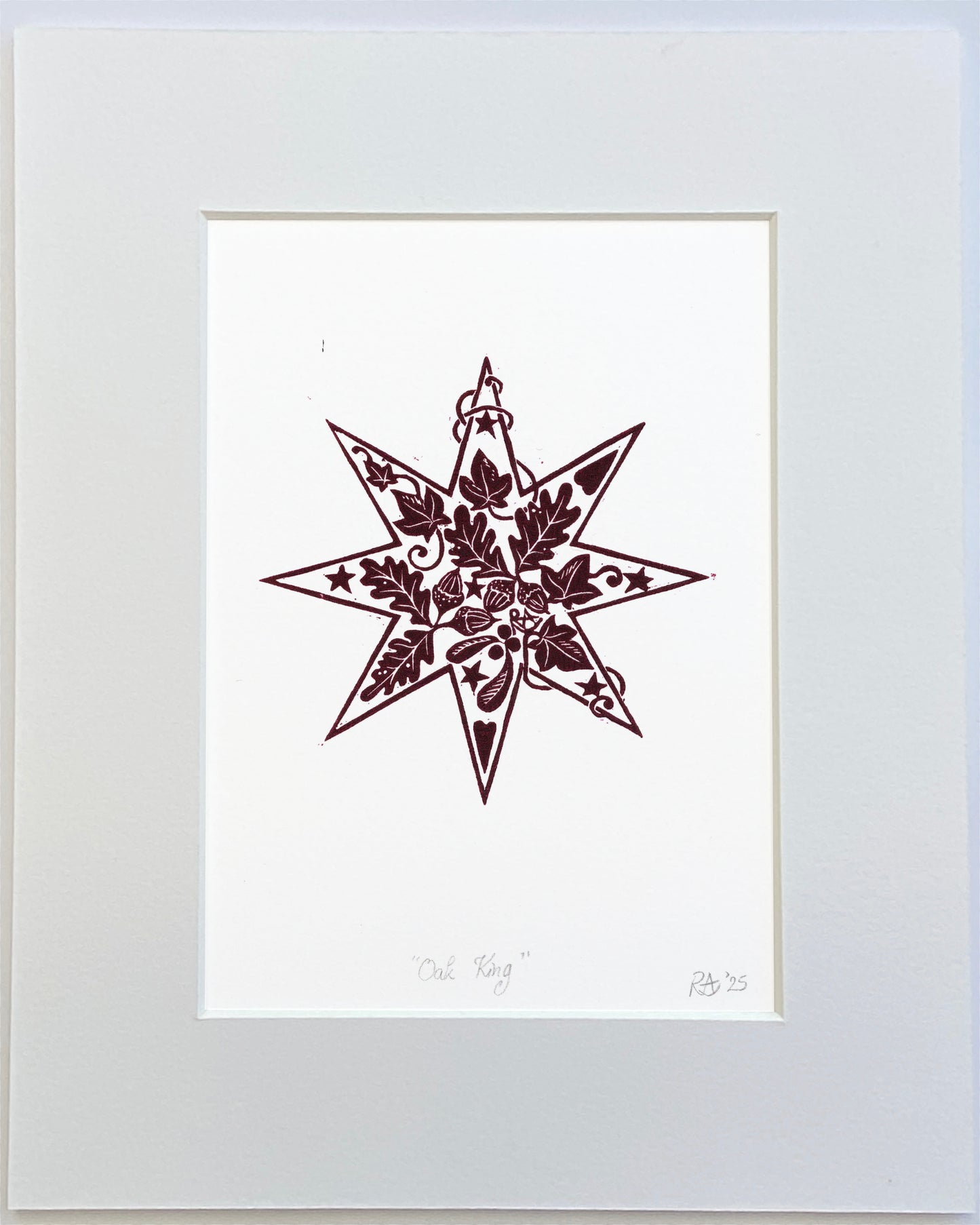 Decorative star design on a white background with a light gray border