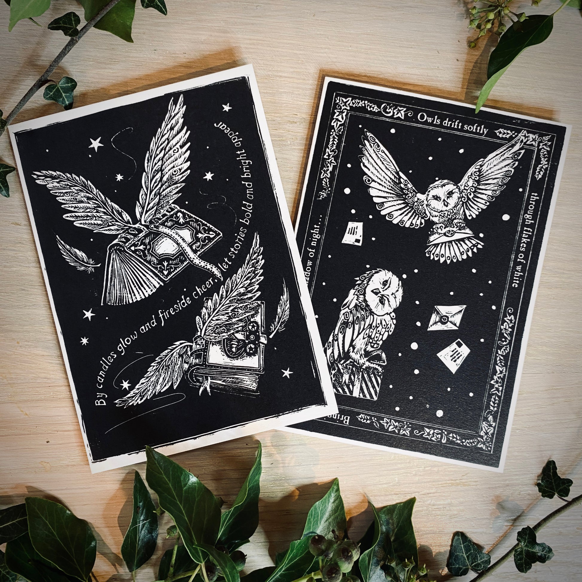 Black and white christmas cards lying on a table