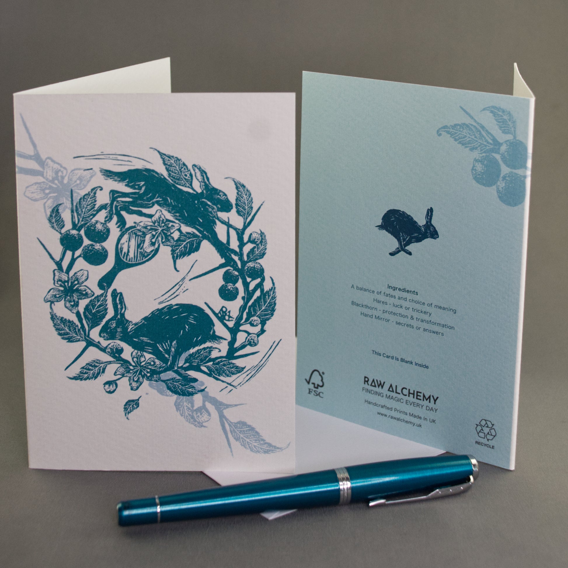 Two greeting cards with hare and blackthorn illustrations featuring the brand 'Raw Alchemy'.