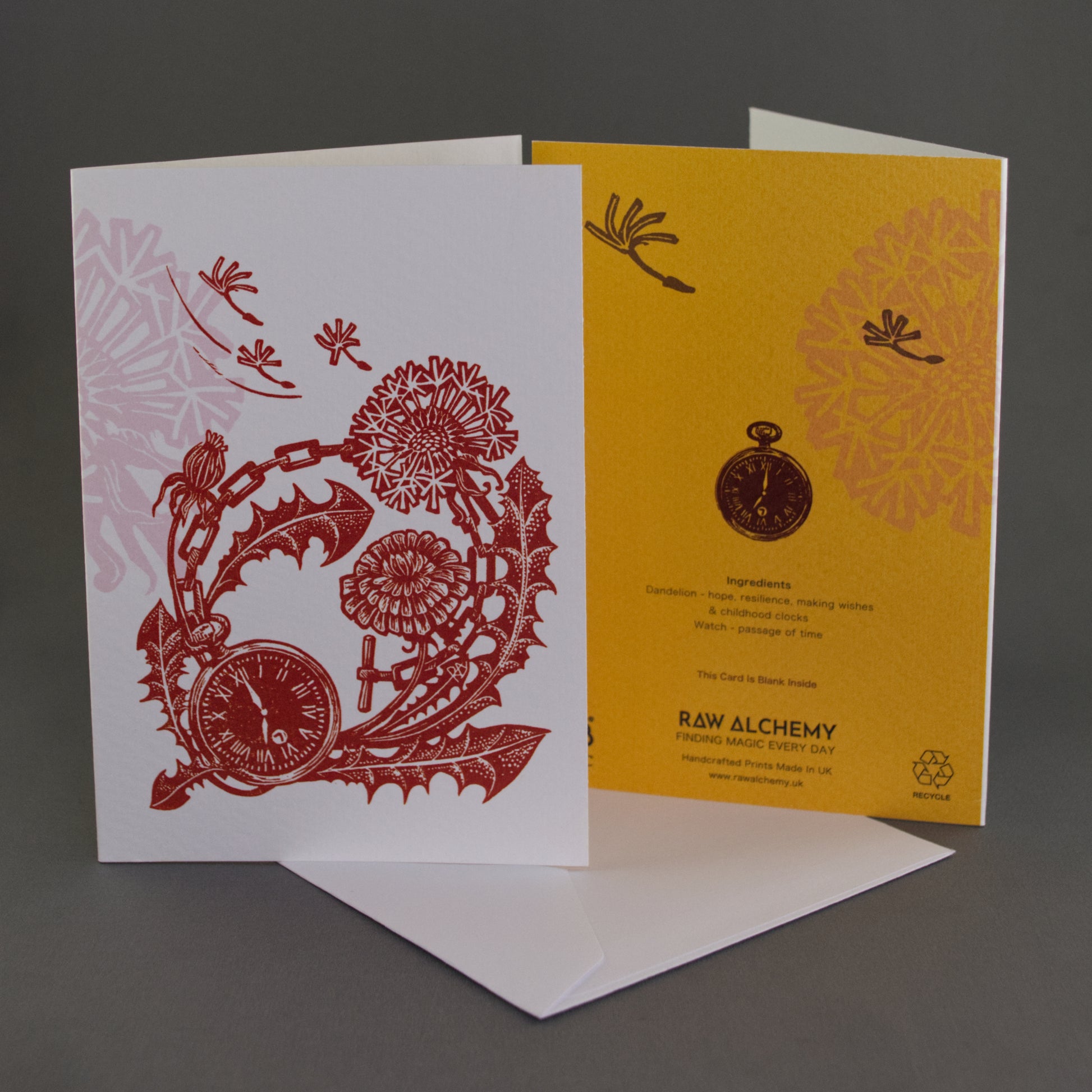 Two greeting cards with intricate designs on a gray background