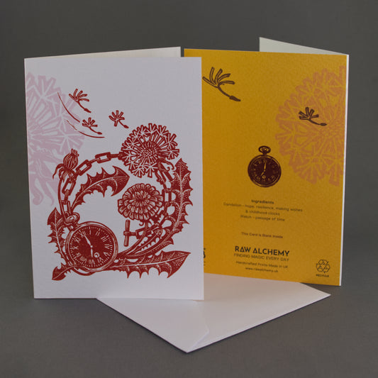 Two greeting cards with intricate designs on a gray background