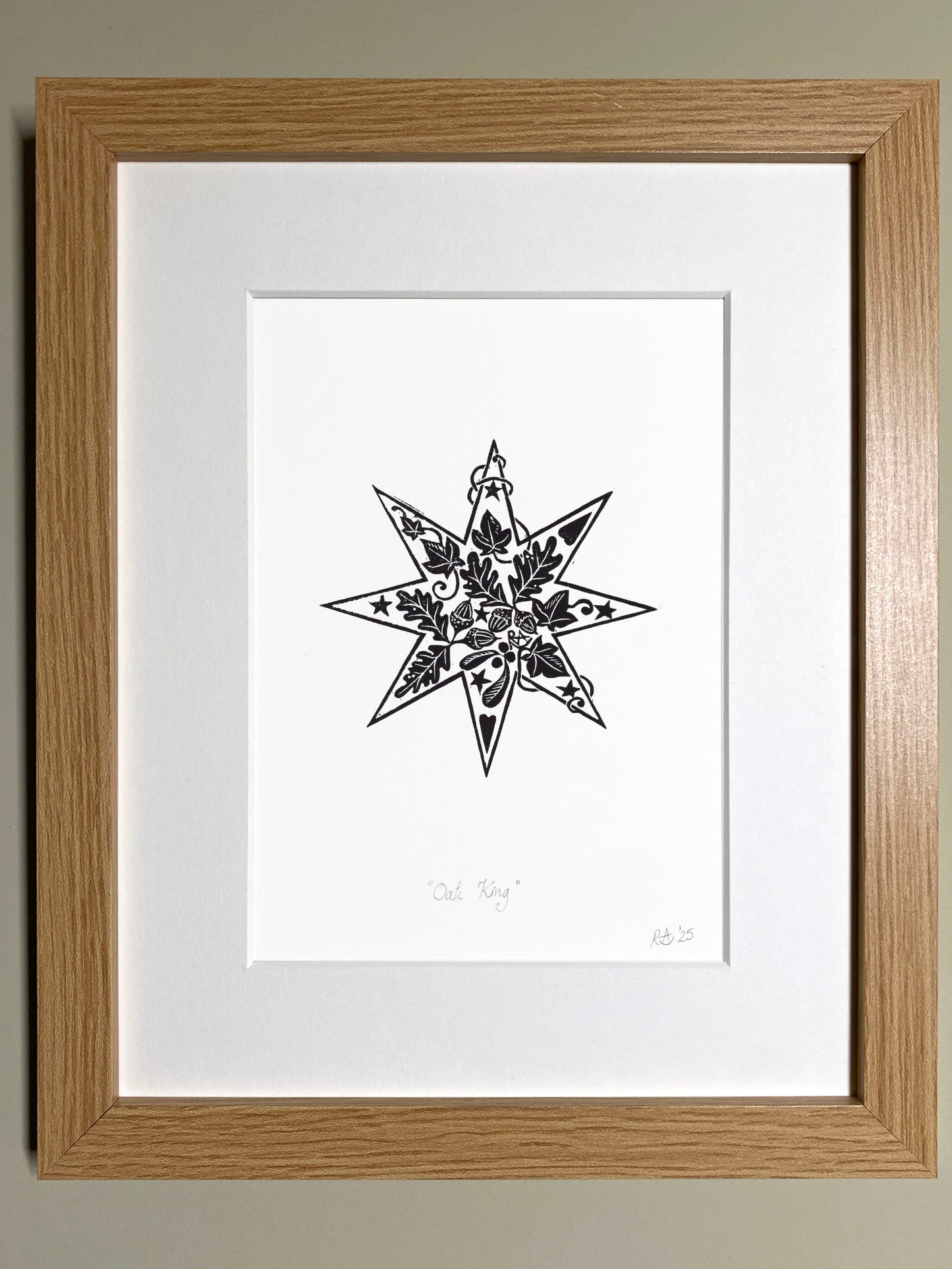Framed black and white star design on a white background