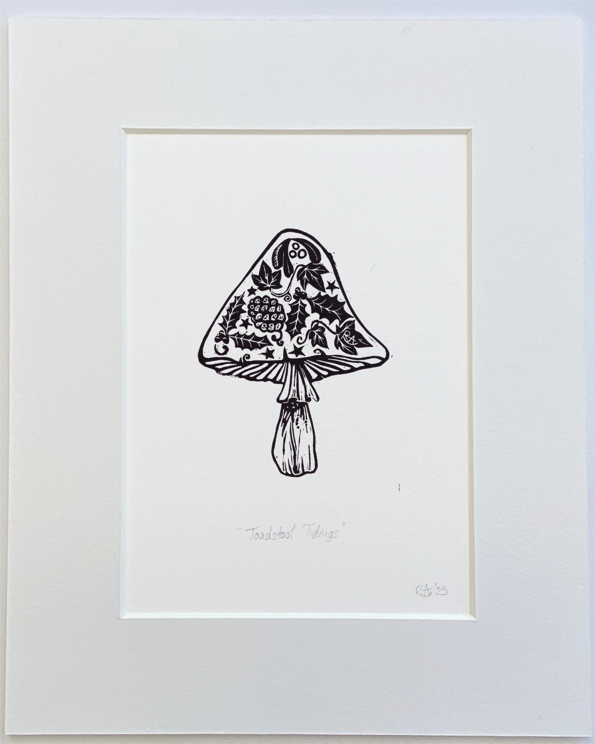 Framed black and white illustration of a decorative mushroom on a white background
