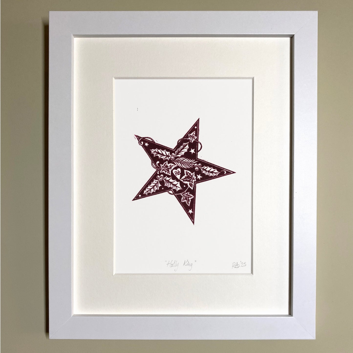 Holly King Star linoprint. Seasonal celebration print in burgundy