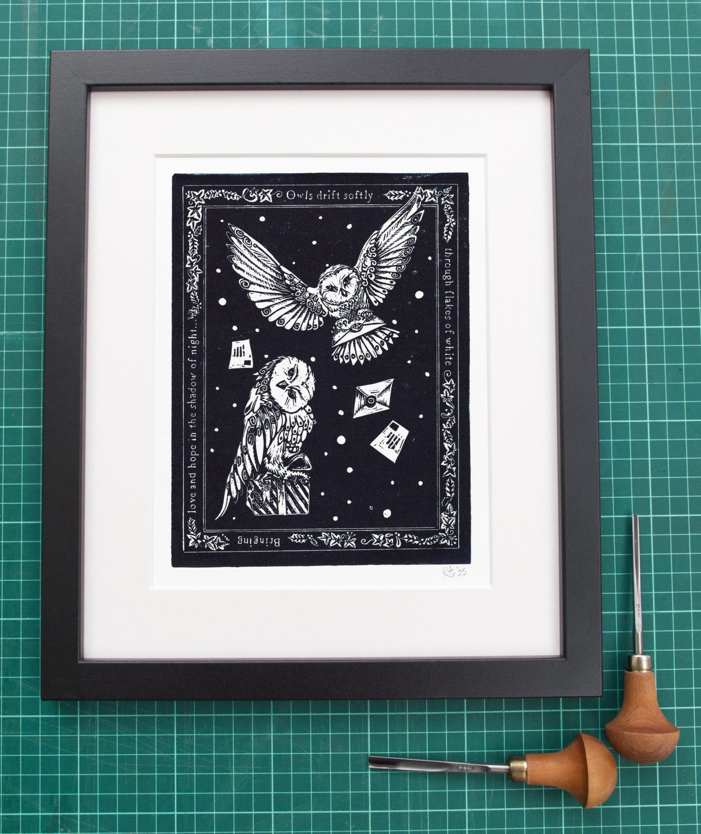 Framed black and white illustration of an owl on a grid background with tools.