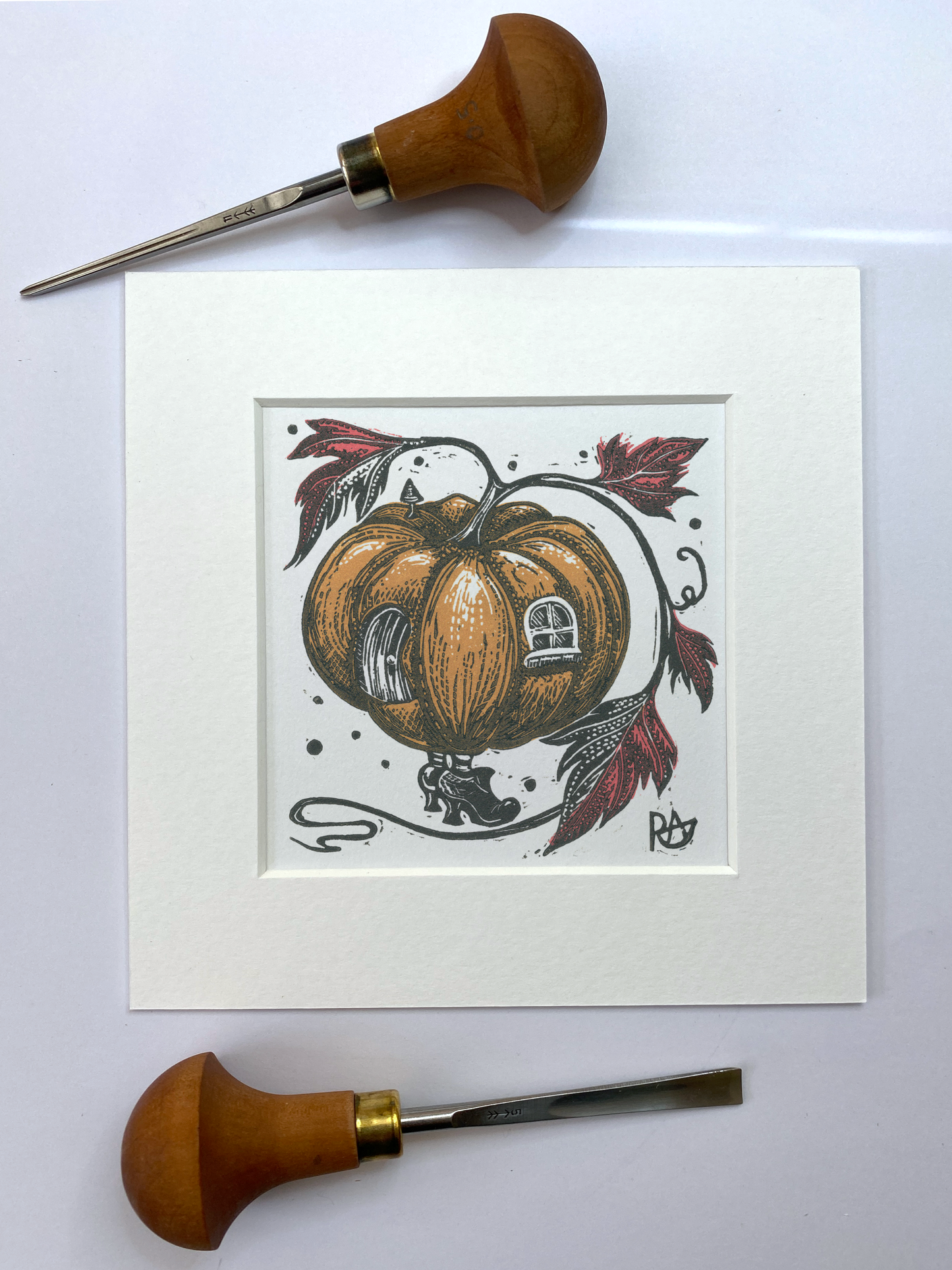 Decorative pumpkin illustration with wooden carving tools on a white background
