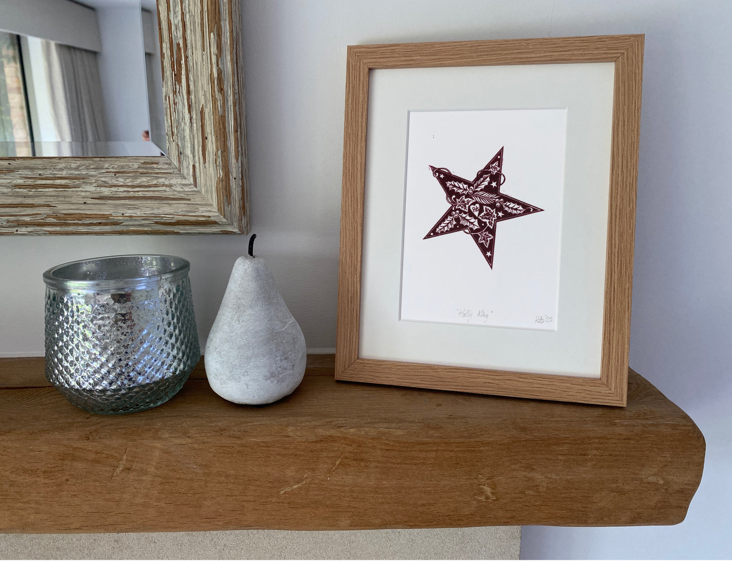 Holly King Star linoprint. Seasonal celebration print in burgundy