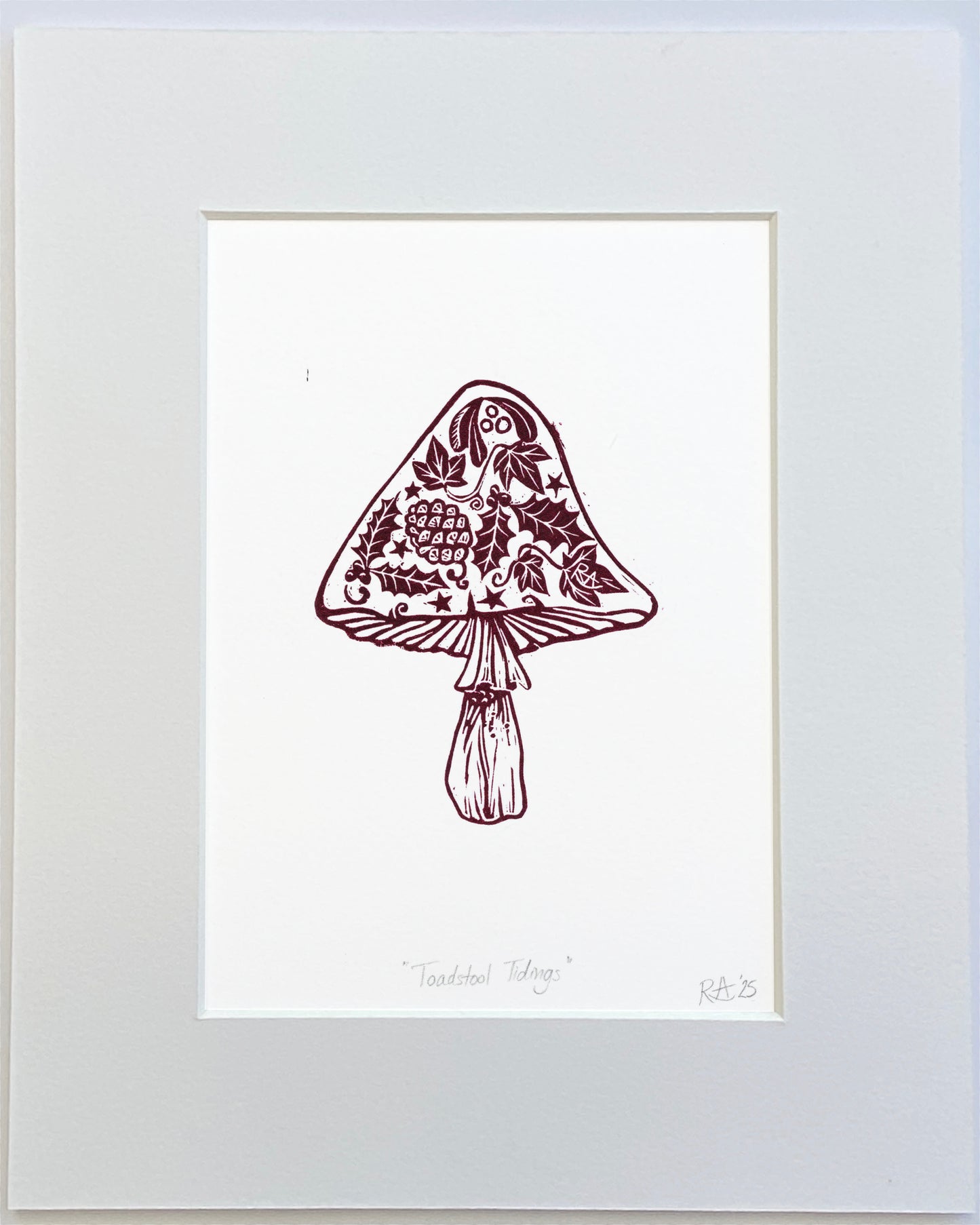 Decorative mushroom illustration with floral patterns on a white background